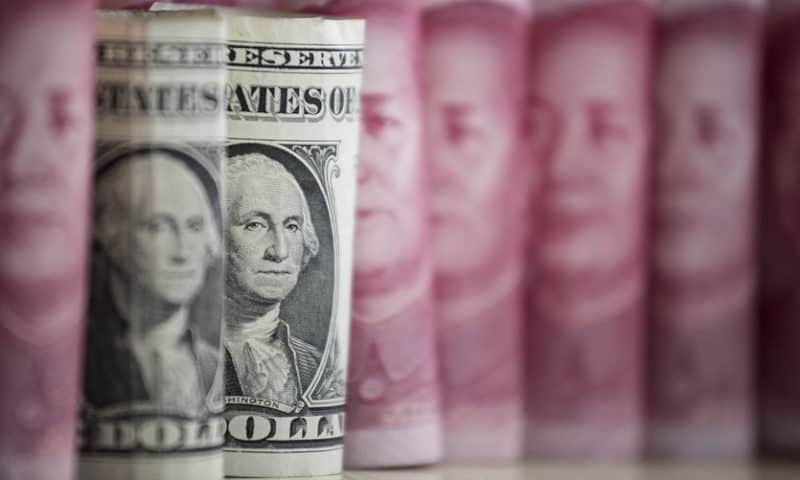 Dollar adds to slide as trade fears are back at center stage