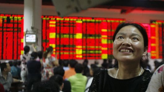 Chinese investors expect a turnaround in the beaten-down stock market, survey shows