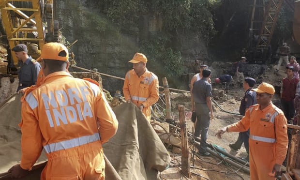 Families pray for Indian miners trapped underground for 13 days