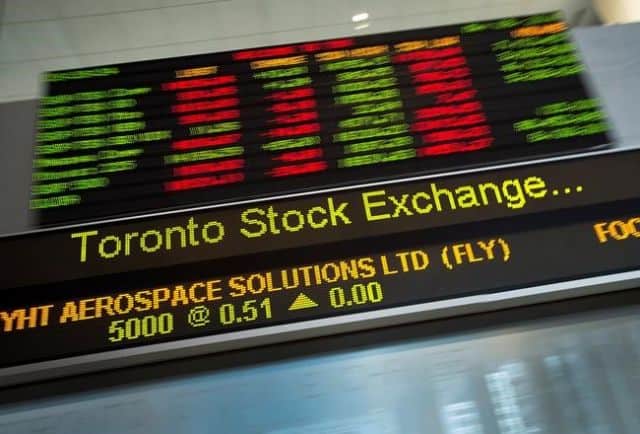 Stocks up loonie down