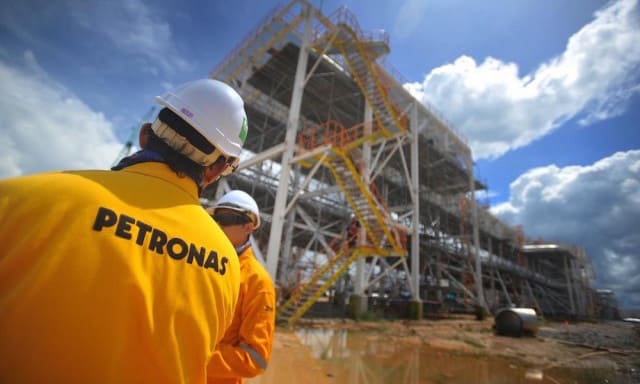 Petronas cuts output