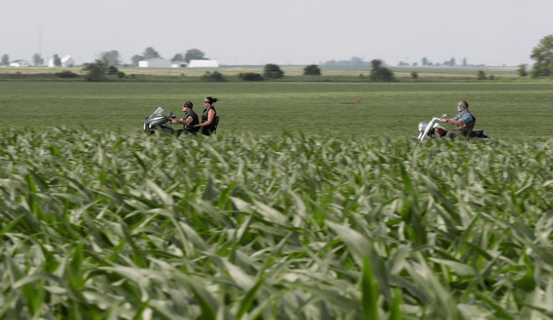 Farmers are stockpiling corn in response to tough growing conditions, waiting for higher prices