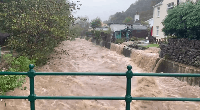 Torrential rain brings floods across Britain