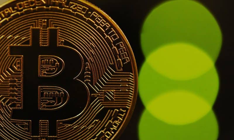 Bitcoin slumps below $7,000 mark for first time in 6 months