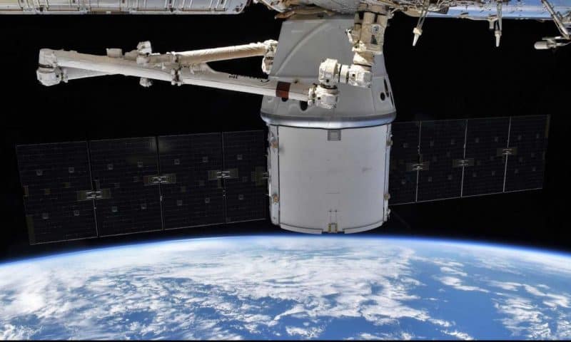 SpaceX Dragon spacecraft caught by robotic space station arm for the last time
